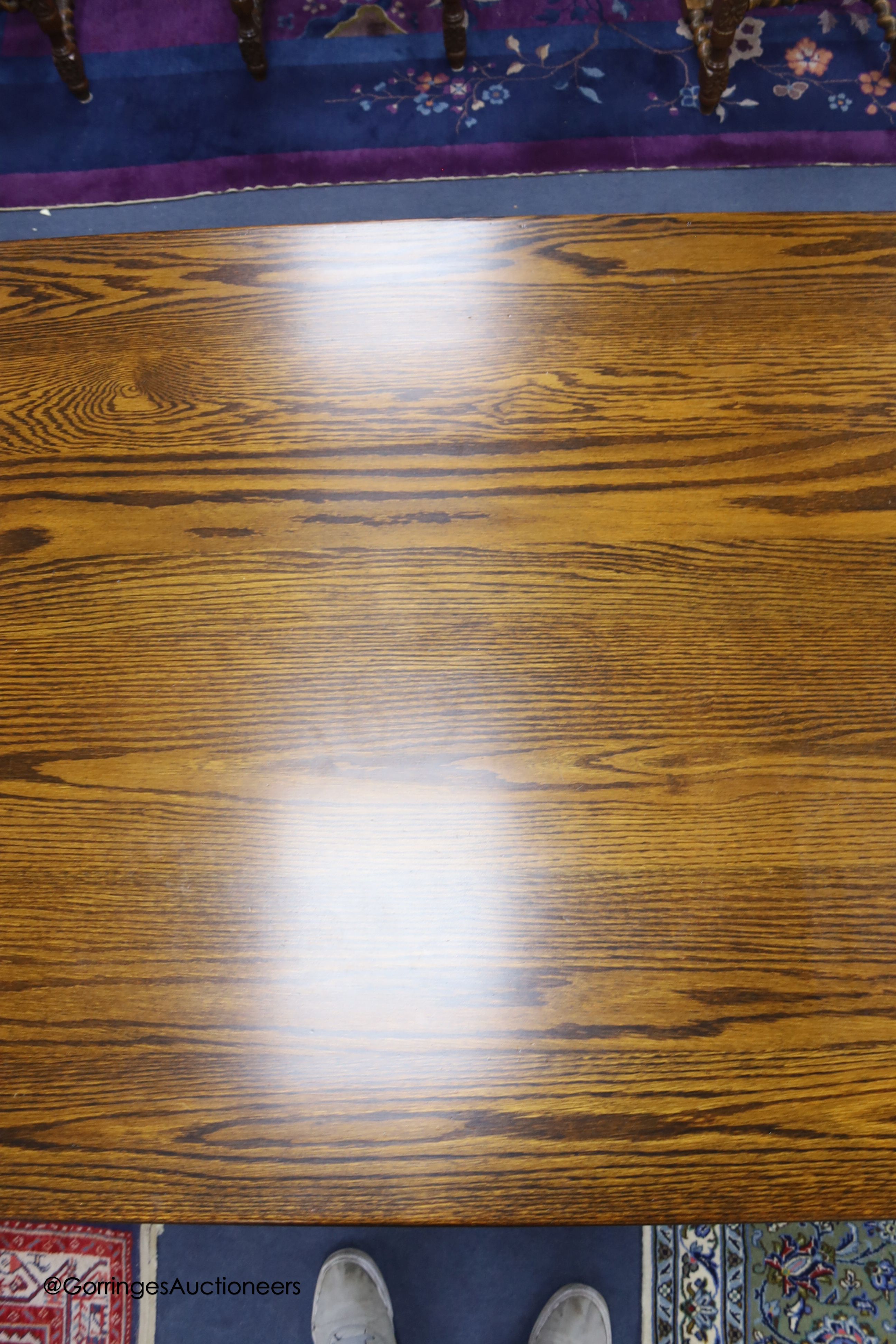 A reproduction 18th century style oak refectory table, width 310cm depth 91cm height 76cm